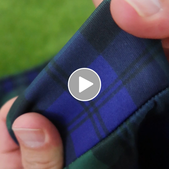 Video of each product in the cosy bundle being handled, folded, squished and flicked, then gently being put away and garnished with a different tiny plastic dinosaur in a tartan scarf.